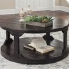 Ashley Rogness Round Cocktail Table In Rustic Brown 0 100x100