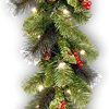 National Tree Company Pre Lit Artificial Christmas Garland Flocked With Mixed Decorations And Lights Crestwood Spruce 9 Ft 0 100x100
