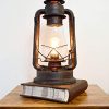 Electric Lantern Table Lamp For Bedrooms To Give You The Perfect Farmhouse Look Large 15 Inches Tall With Large Hurricane Glass And In Line Cord Dimmer Rustic Rust Patina Hand Finish 0 100x100